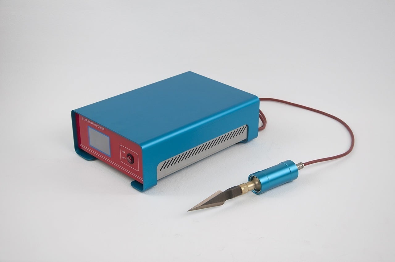 Ultrasonic knife with carbide blade, high speed cutting.